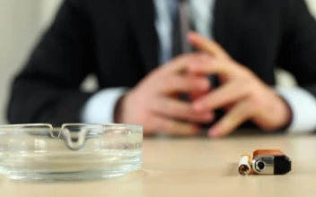 Stock Video Man In Suit Lights A Cigarette And Starts Smokin Animated Wallpaper
