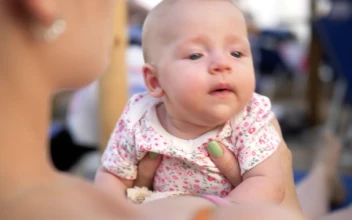 Stock Video Mother With Her Infant At The Seaside