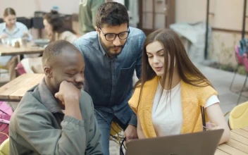 Stock Video Motivated Team Hi Fives After Successful Launch