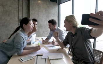 Stock Video Motivated Work Team Taking A Selfie