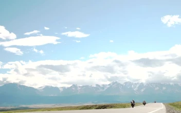 Stock Video Motorcycle Choppers Ride Down Mountain Road
