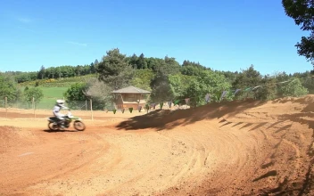 Stock Video Motorcyclist Turning Around A Bend On Motocross Race