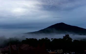 Stock Video Mountain Village Covered In Mist