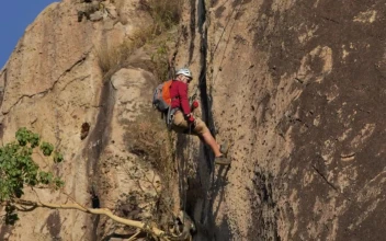 Stock Video Mountaineer Descending A Rocky Mountain