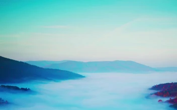 Stock Video Mountainous Autumn Landscape Covered In Mist