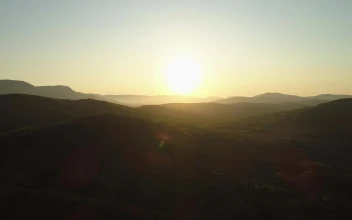 Stock Video Mountains Below A Clear Sky