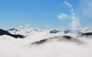 Stock Video Mountains Covered In Mist To The Top