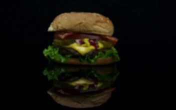Stock Video Moving Towards A Burger