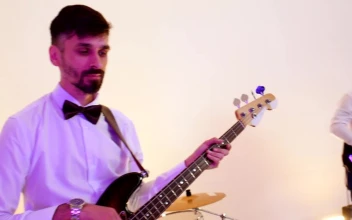 Stock Video Musical Band Performing A Song In A Bright Studio