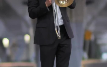 Stock Video Musician Dressed In Black Suit At The Street