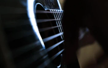 Stock Video Musician Playing A Guitar Indoors