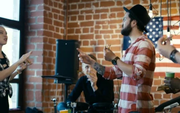 Stock Video Musician Seating Pizza During Rehearsal Break