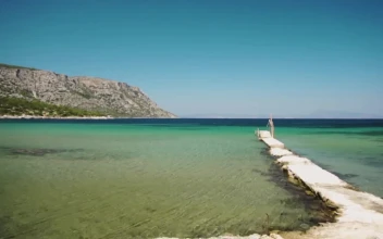 Stock Video Natural Stone Pier At The Beach