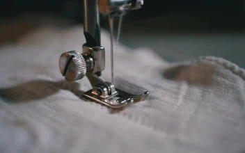 Stock Video Needle Sewing In Slow Motion