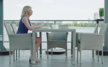 Stock Video Nervous Woman Waits Alone At Outdoor Restaurant