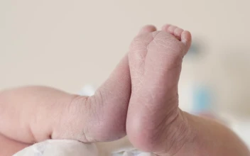 Stock Video Newborn Baby Laying On A Table