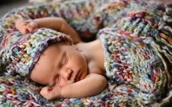 Stock Video Newborn Baby Sleeping On His Back