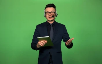Stock Video Newscaster With Tablet And Headset Speaking