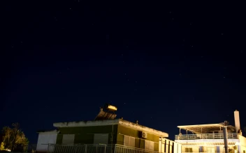 Stock Video Night Sky Above Small Houses
