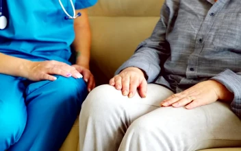 Stock Video Nurse Gives Woman Hope By Holding Hands