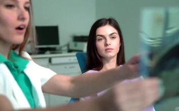 Stock Video Nurse Shows Patient X Ray In Hospital Room