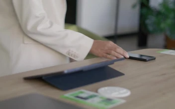 Stock Video Office Desk With Smartphones