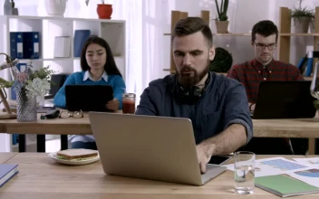 Stock Video Office With People Working On Computers