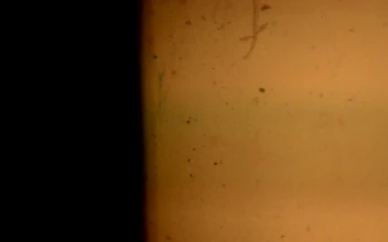 Stock Video Old Film Playing On A Surface