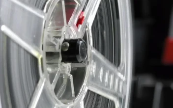 Stock Video Old Film Spinning While Playing