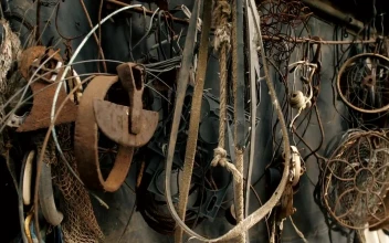 Stock Video Old Metal Items Hanging On The Wall