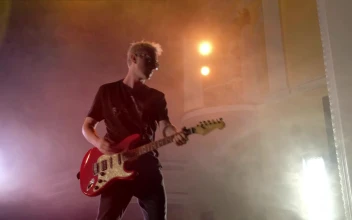Stock Video Old Musician Playing The Guitar On A Stage