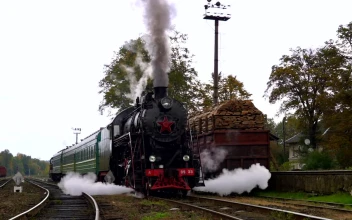 Stock Video Old Steam Train Starts To Move