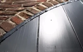 Stock Video Old Windmill With Large Propellers Seen From Its Base