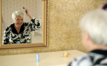 Stock Video Old Woman Combing Her Gray Hair