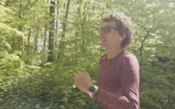 Stock Video Older Woman Jogging Outside