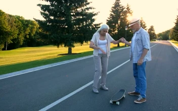Stock Video Older Woman Learning To Skate