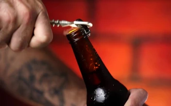 Stock Video Opening A Beer Bottle Close Up View