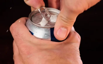 Stock Video Opening A Can Of Beer Close Up View