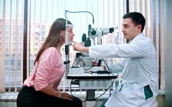 Stock Video Ophthalmologist And A Patient During An Eyesight Test
