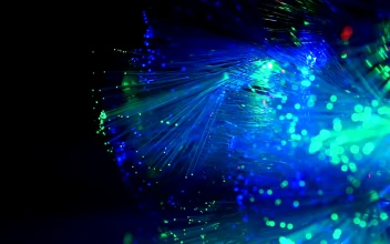 Stock Video Optic Fiber Glowing In Blue