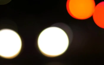 Stock Video Orange And White Bokeh Effect Lights