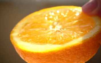 Stock Video Orange Dripping With Water