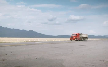 Stock Video Orange Heavy Cargo Transport Moving On The Road