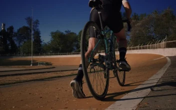 Stock Video Outdoor Cycling Track With Some Cyclists