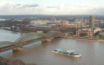 Stock Video Over A Train While Crossing A River Bridge