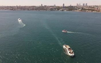 Stock Video Over The Sea With Boats Near A Sunny Coast