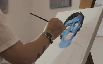 Stock Video Painter Depicting An Artistic Work On A Canvas