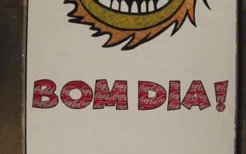 Stock Video Painted Sign On A Building With The Words Bom Dia