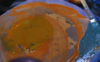 Stock Video Painter Mixing Blue Paint