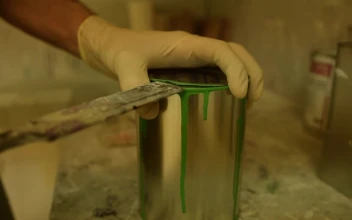 Stock Video Painter Opening A Can Of Green Paint